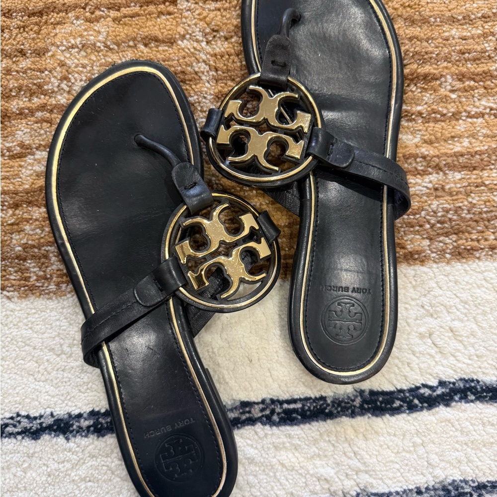 Tory Burch Black Sandals with Gold Emblem